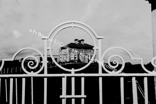 VIEW OF DEANS HOUSE THROUGH GATE